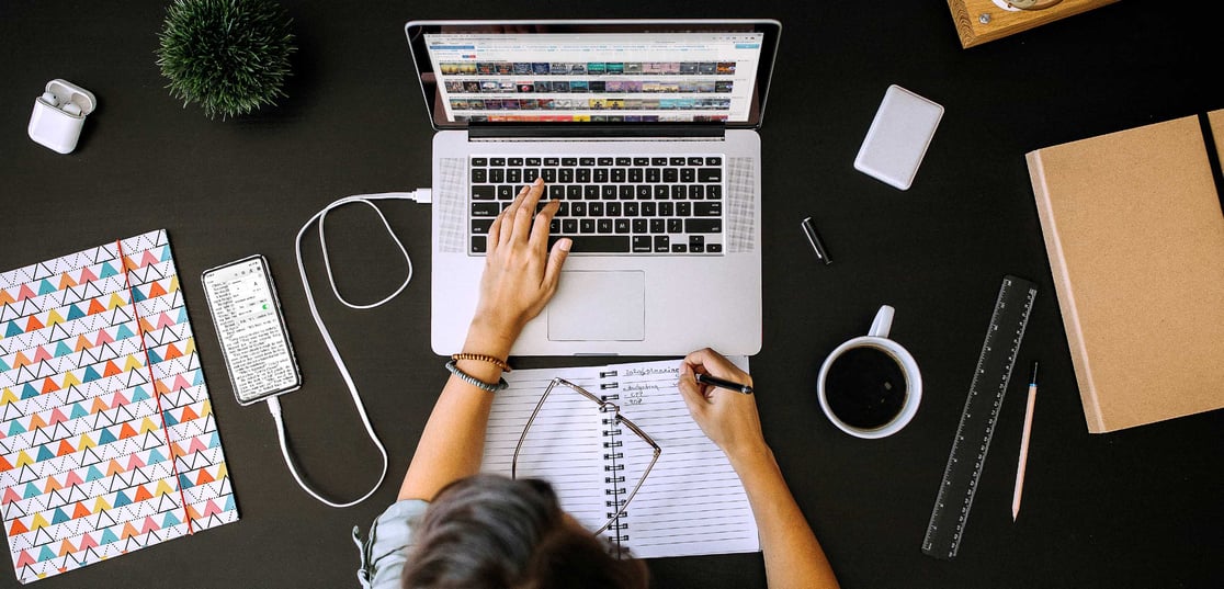 iStock-1277520107 woman at desk laptop above